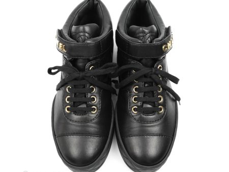 Chanel Black Leather Sneakers Gold Hardware For Sale